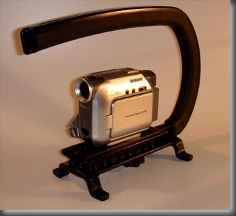 The Scorpion camera grip holding a small camcorder